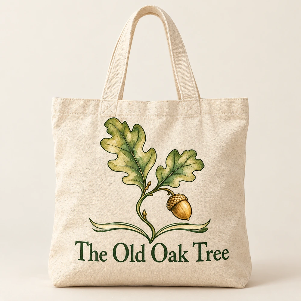 Natural canvas tote bag printed with the oak leaf and open book emblem and The Old Oak Tree title